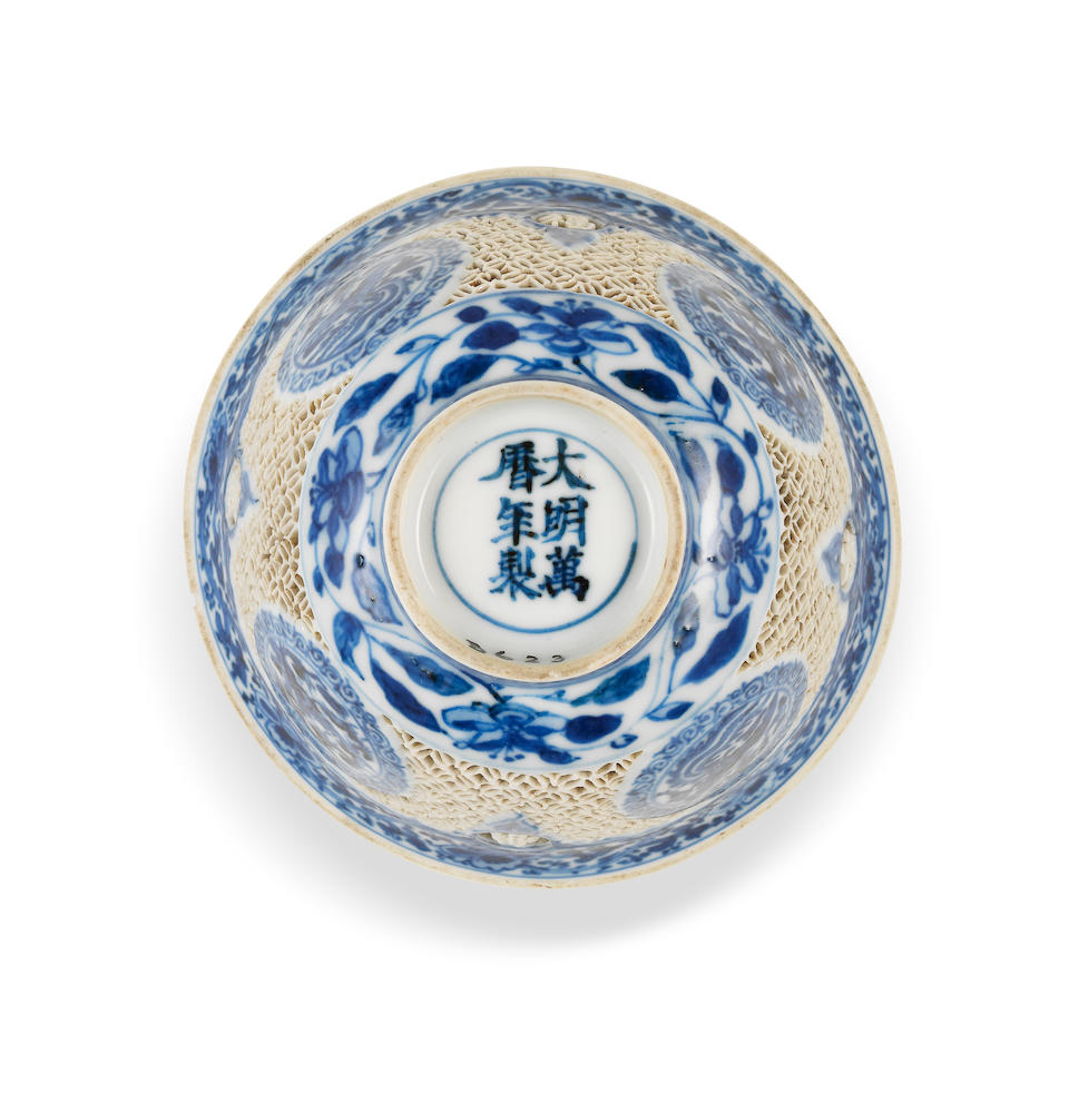 A rare pair of blue and white reticulated cups Wanli six-character marks and of the period (2)