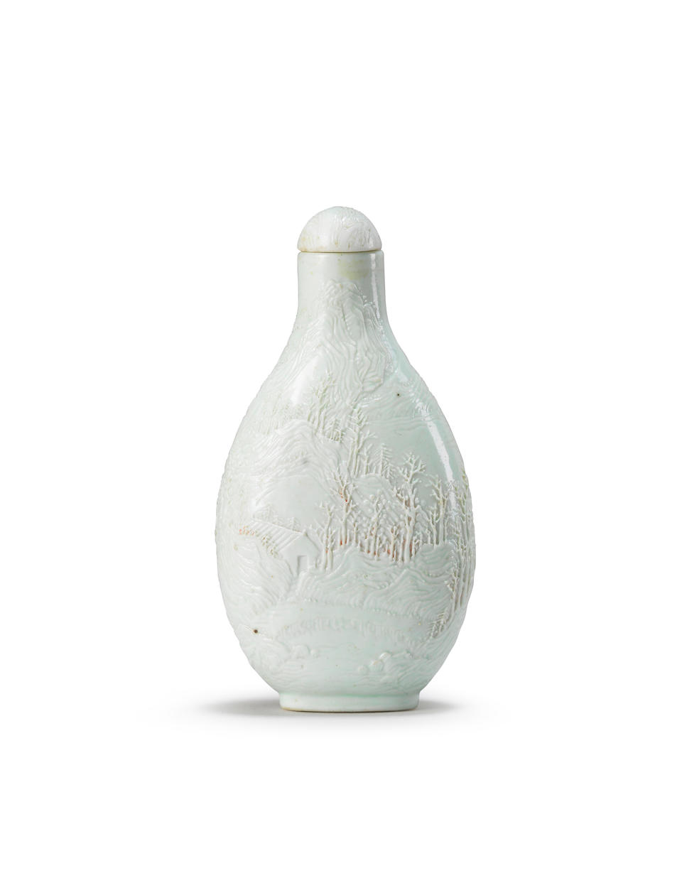 A carved very pale turquoise-glazed snuff bottle Chen Guozhi four-character mark, circa 1820-1860 (2)