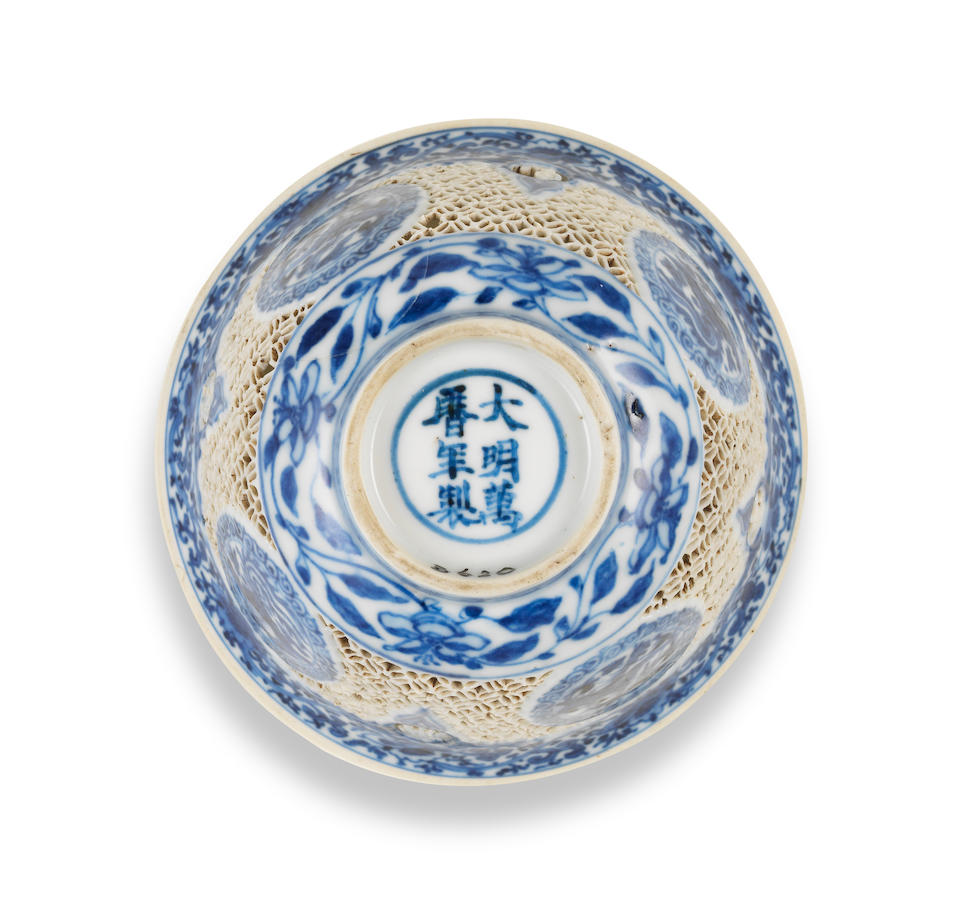 A rare pair of blue and white reticulated cups Wanli six-character marks and of the period (2)