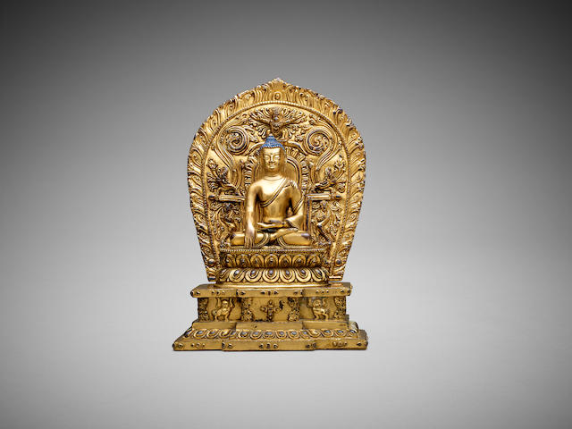 A gilt-bronze figure of Shakyamuni