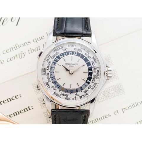 Patek Philippe. An 18K white gold automatic world time wristwatchRef:5110, Case No.4142074, Movement No.3207265, retailed by Patek Philippe Salons de Geneve 7th August 2001