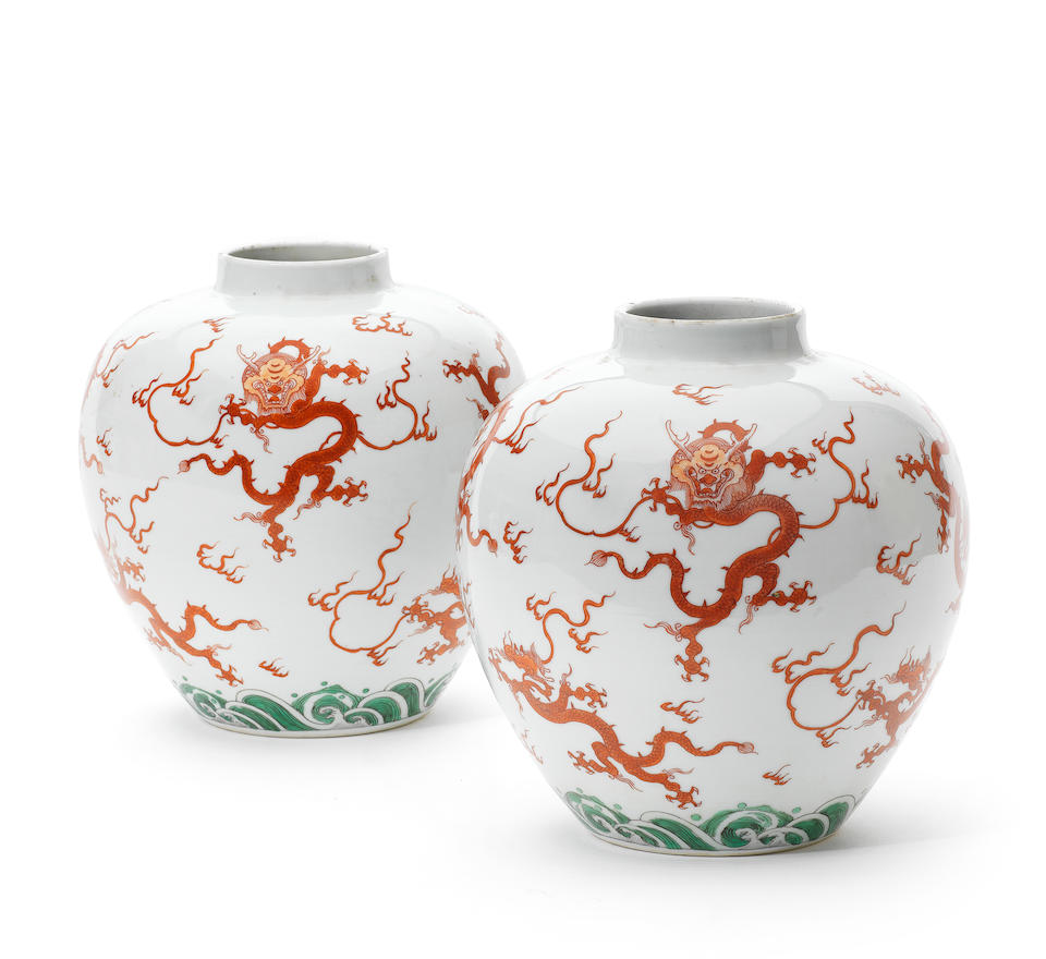 A very rare pair of iron-red and green-enamelled ovoid jars Yongzheng six-character marks and of the period (2)