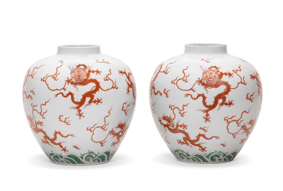 A very rare pair of iron-red and green-enamelled ovoid jars Yongzheng six-character marks and of the period (2)