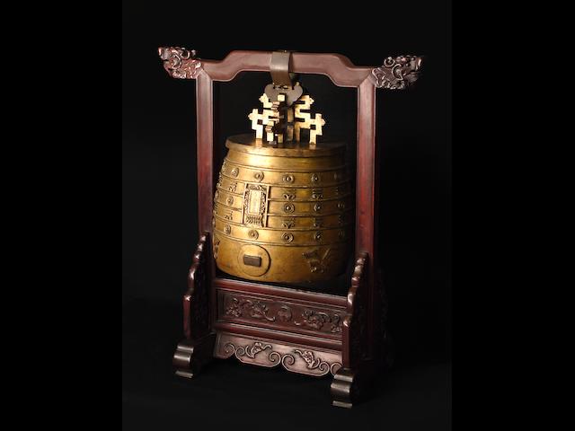 A rare Imperial gilt-bronze archaistic ritual bell, bianzhong Qianlong mark and of the period, dated to the 10th year, corresponding to AD 1745 (2)