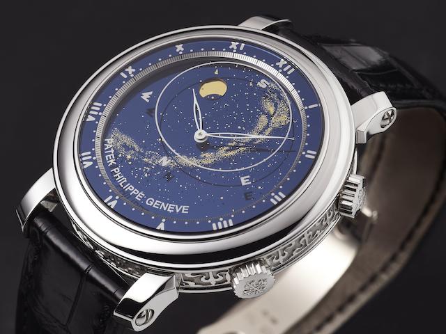 Patek Philippe. An extremely fine and rare white gold automatic astronomical wristwatch with sky chart, phase and orbit of the moon, time of meridian, passage of Sirius and the moon with box and papers  Celestial, Ref:5102G-001, Case No.425****, Movement No.332****, Circa 2008