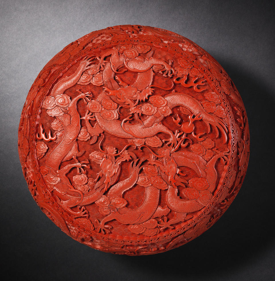 A cinnabar lacquer 'nine dragons' box and cover Qianlong (2)