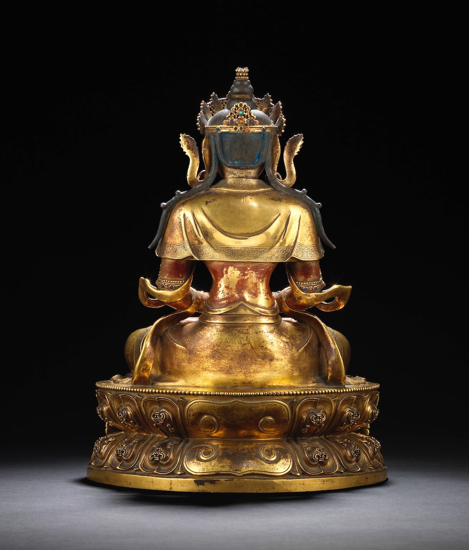 A rare Imperial gilt-lacquered bronze figure of Amitayus Kangxi