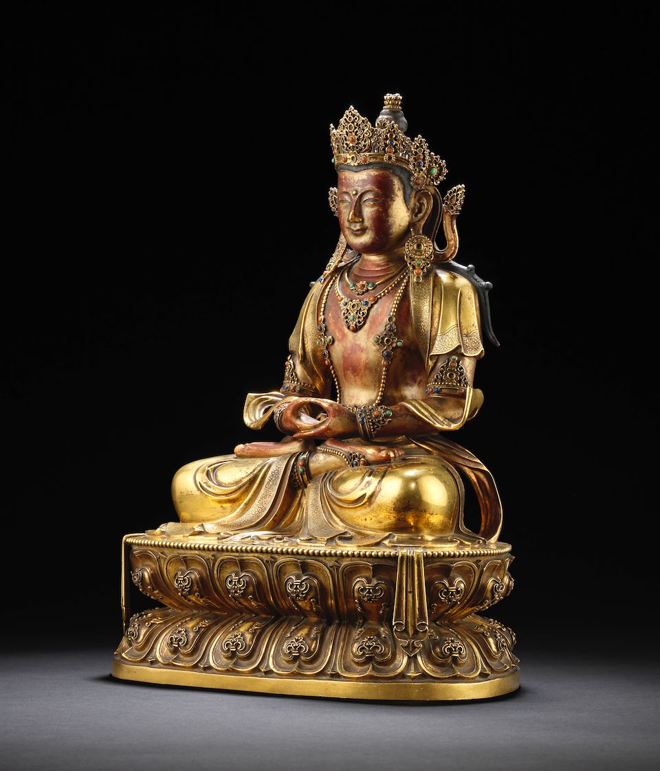 A rare Imperial gilt-lacquered bronze figure of Amitayus Kangxi