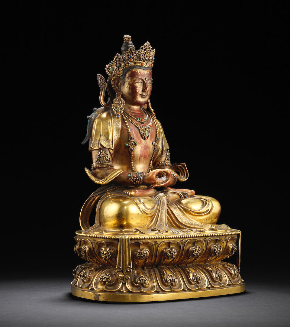 A rare Imperial gilt-lacquered bronze figure of Amitayus Kangxi