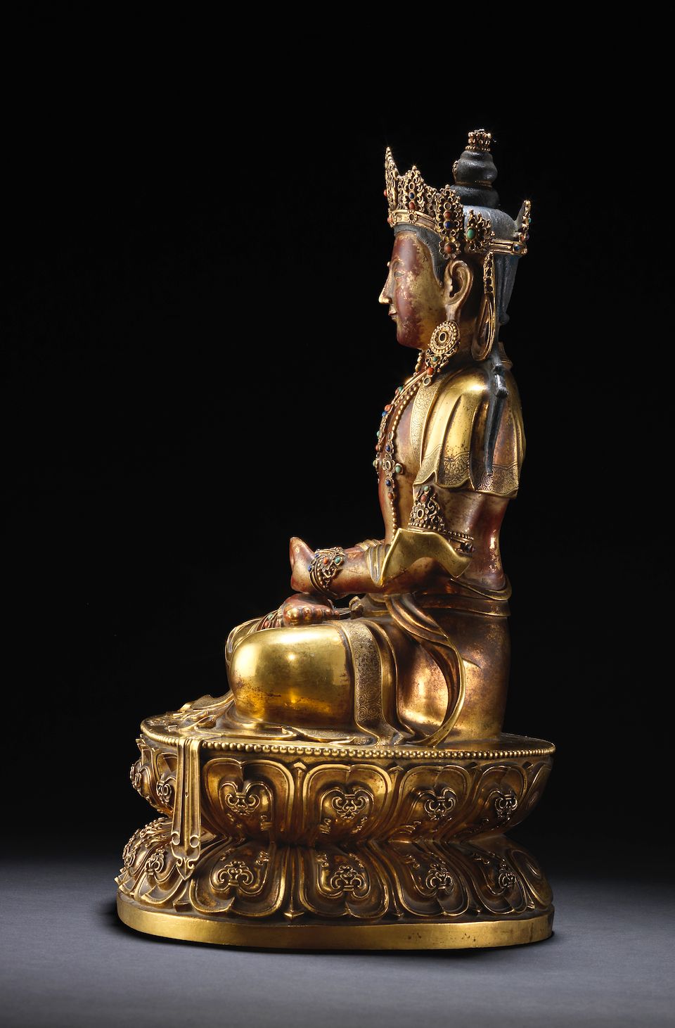 A rare Imperial gilt-lacquered bronze figure of Amitayus Kangxi
