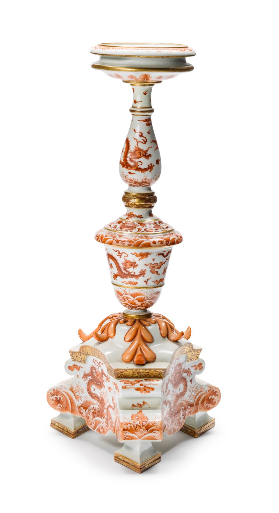 An extremely rare Imperial iron-red and gilt-decorated 'dragon' candlestick Yongzheng seal mark and of the period (2)