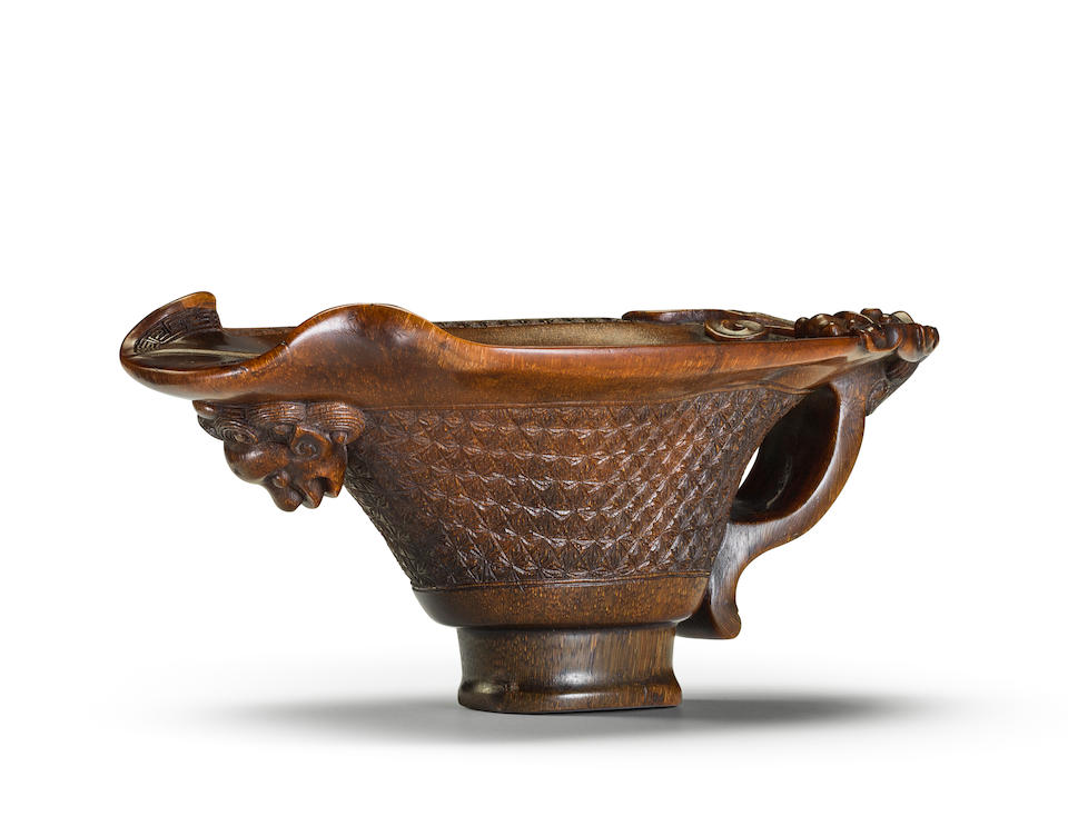 An archaistic carved rhinoceros horn libation cup 17th/18th century