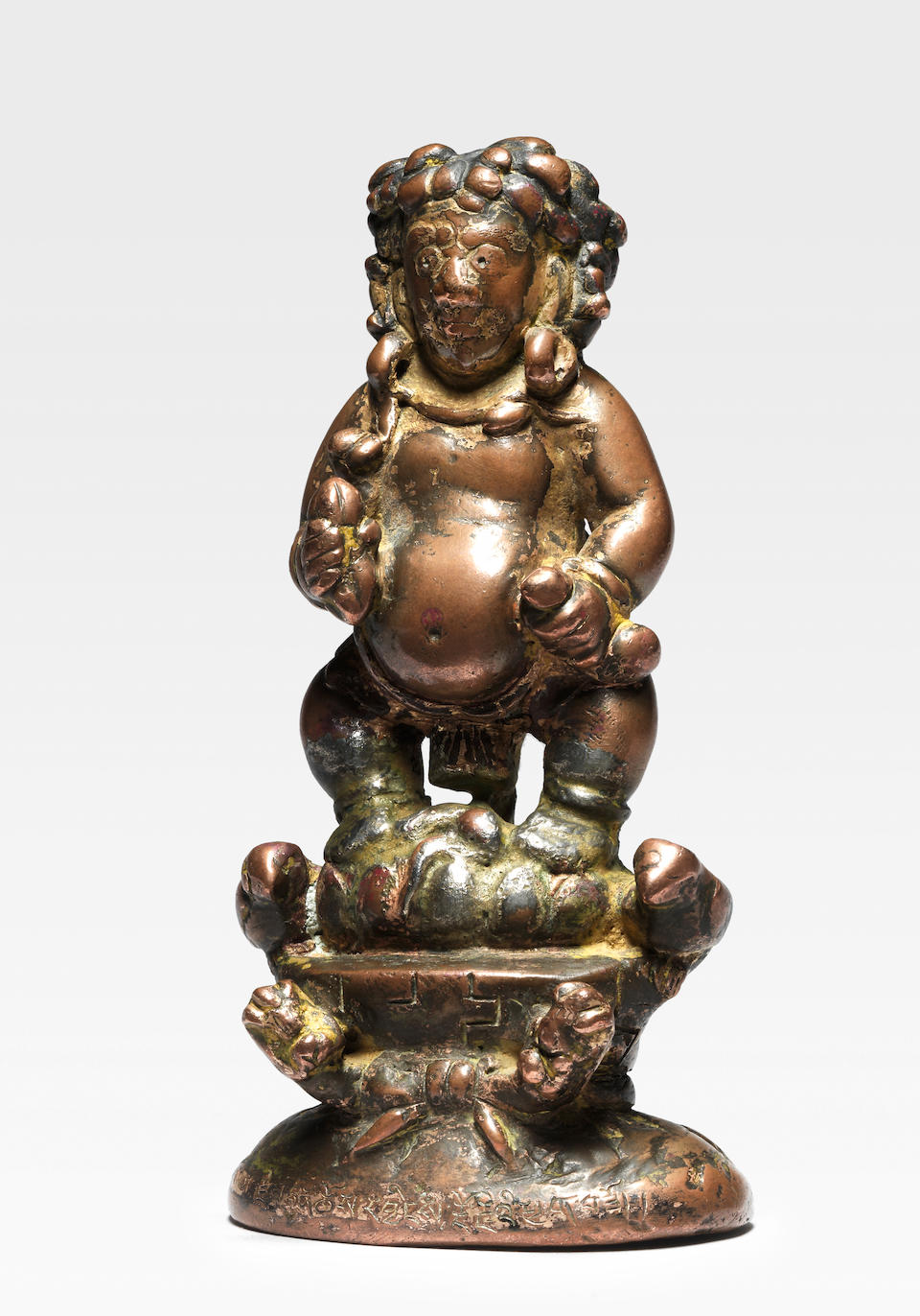 A COPPER COMPOSITE FIGURE OF VAJRAPANI AND KUBERA ATTRIBUTED BY INSCRIPTION TO THE TENTH KARMAPA, CHOYING DORJE (1604-1674)&#8232;