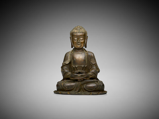 A Chinese bronze figure of a seated Buddha 17th century
