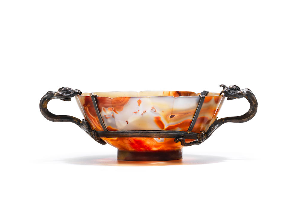 A very rare agate lobed 'mallow' bowl The bowl Song Dynasty or later; the silver mounts possibly 16th/17th century