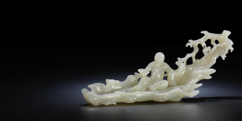 A magnificent Imperial white jade carving of Zhang Qian on a raft Incised Qianlong seal mark and of the period