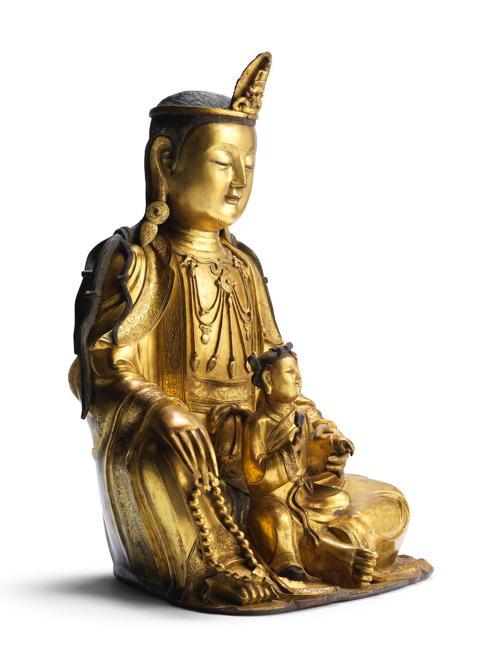 A very rare and large gilt-bronze figure of Guanyin and Shancai 17th century (2)