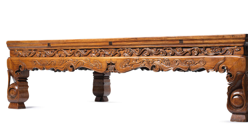 An important and exceptionally rare huanghuali table, kangzhuo 17th century