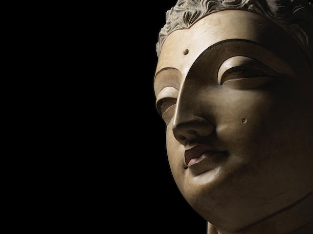 A POLYCHROMED STUCCO HEAD OF BUDDHA ANCIENT REGION OF GANDHARA, CIRCA 4TH/5TH CENTURY