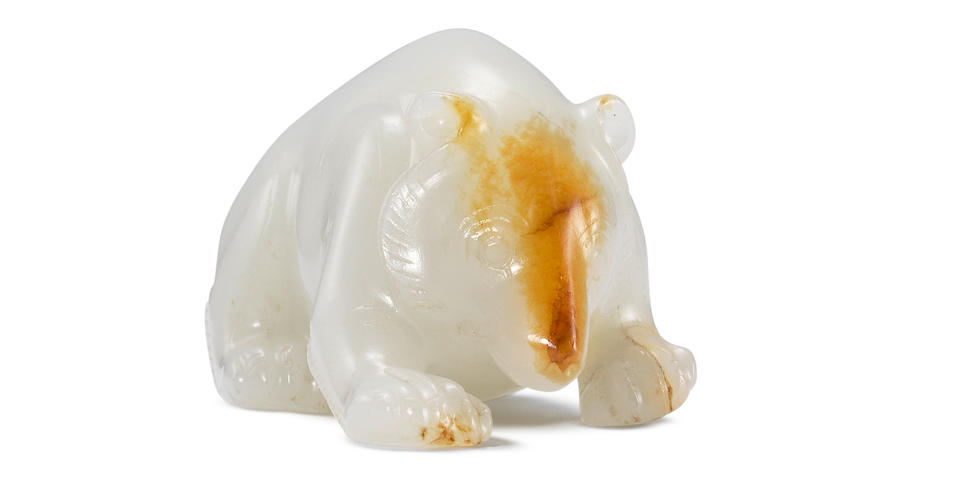 An exceedingly rare and important white and russet jade carving of a bear Western Han Dynasty (2)