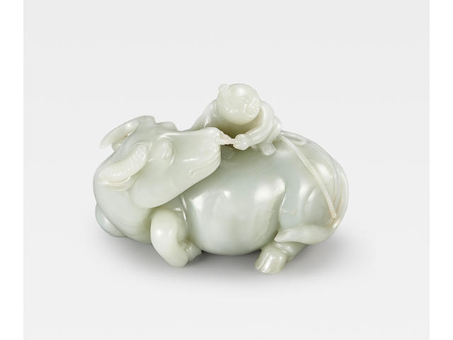A superbly carved pale green jade 'water-buffalo and boy' group Qianlong