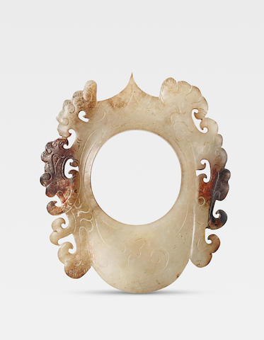 A rare white and russet jade 'phoenix' pendant Western Han Dynasty (2)