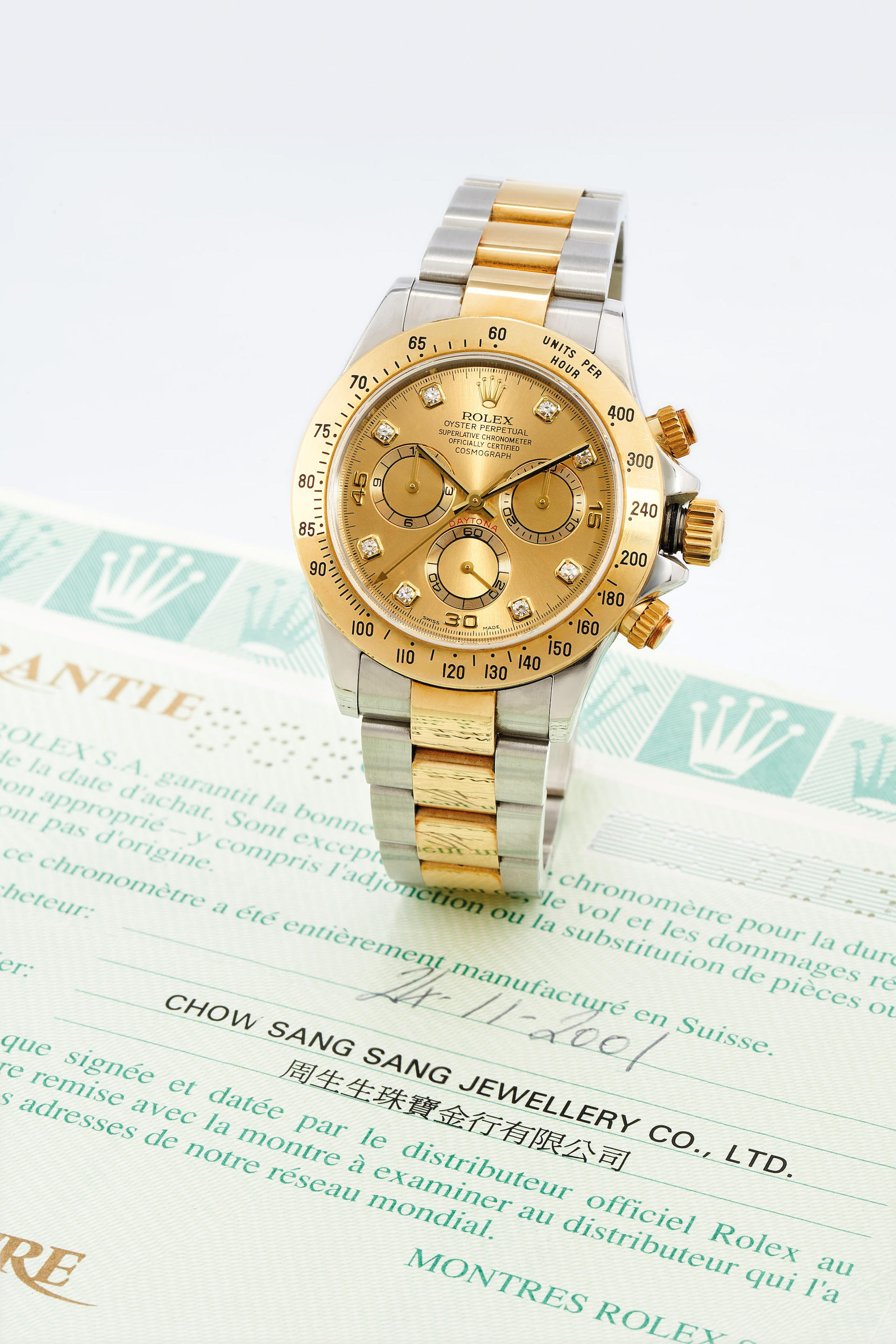 Rolex. A Yellow Gold and Stainless Steel Chronograph Bracelet watch with...
