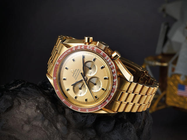 Omega. A Fine Yellow Gold Chronograph Bracelet Watch Commemorating the Apollo XI Moonlanding in 1969, With box and extract