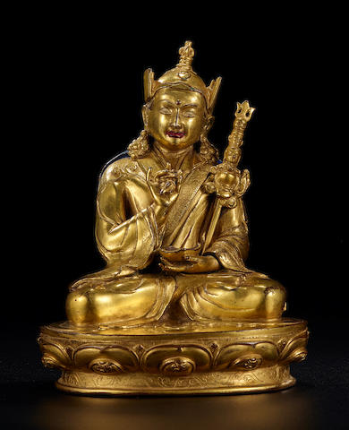 A gilt copper-alloy figure of Padmasambhava Tibet, 16th/17th century