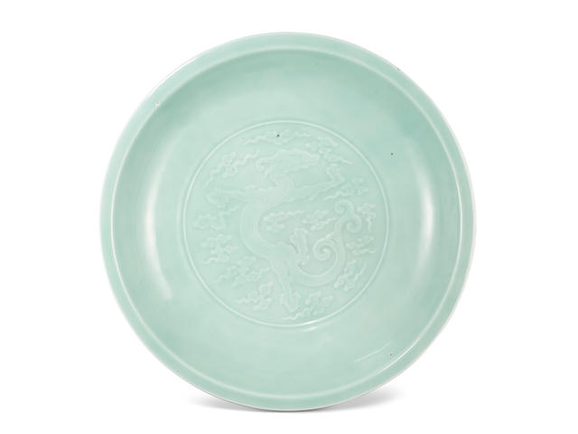 A large imperial celadon-glazed 'dragon' charger Yongzheng seal mark and of the period