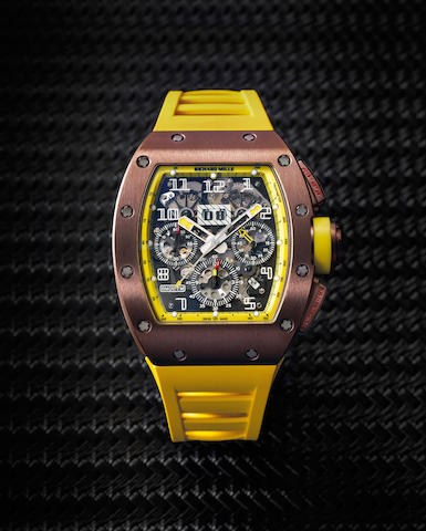 Richard Mille. A Limited Edition Titanium Automatic Skeleotnized Flyback Chronograph wristwatch, Ref. RM11, No.00/30, With Box, Certificate and Pouch