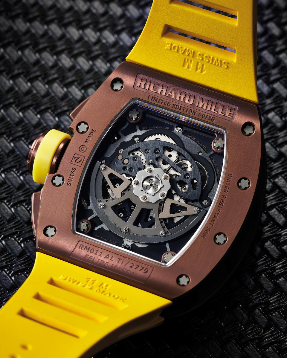 Richard Mille. A Limited Edition Titanium Automatic Skeleotnized Flyback Chronograph wristwatch, Ref. RM11, No.00/30, With Box, Certificate and Pouch