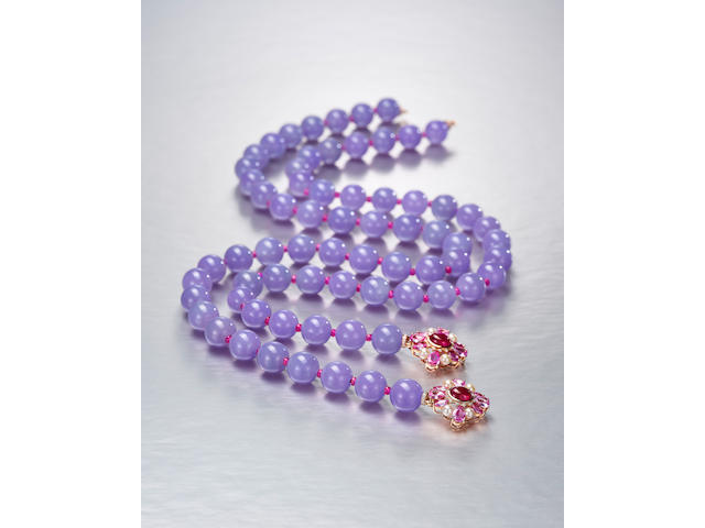 An Exceptional Strand Lavender Jadeite Bead Necklace