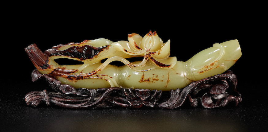 A yellow jade 'lotus root' brushrest 18th century (3) image 1