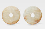 Thumbnail of A very rare pair of large white and russet jade discs, bi Late Warring States/mid Western Han Dynasty (3) image 1