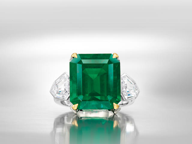 AN IMPORTANT AND RARE EMERALD AND DIAMOND RING
