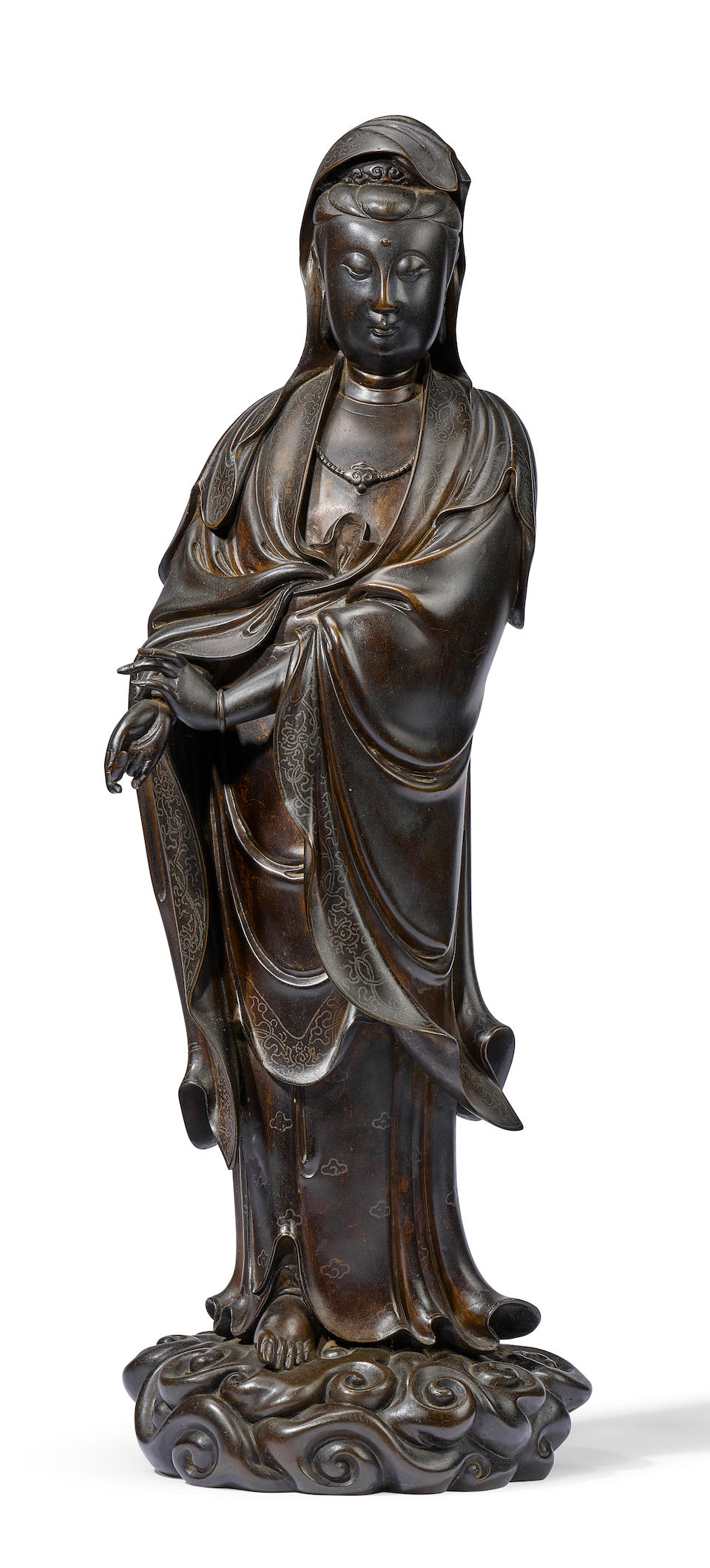 A VERY RARE AND LARGE SILVER-INLAID BRONZE FIGURE OF GUANYIN 16th/17th century