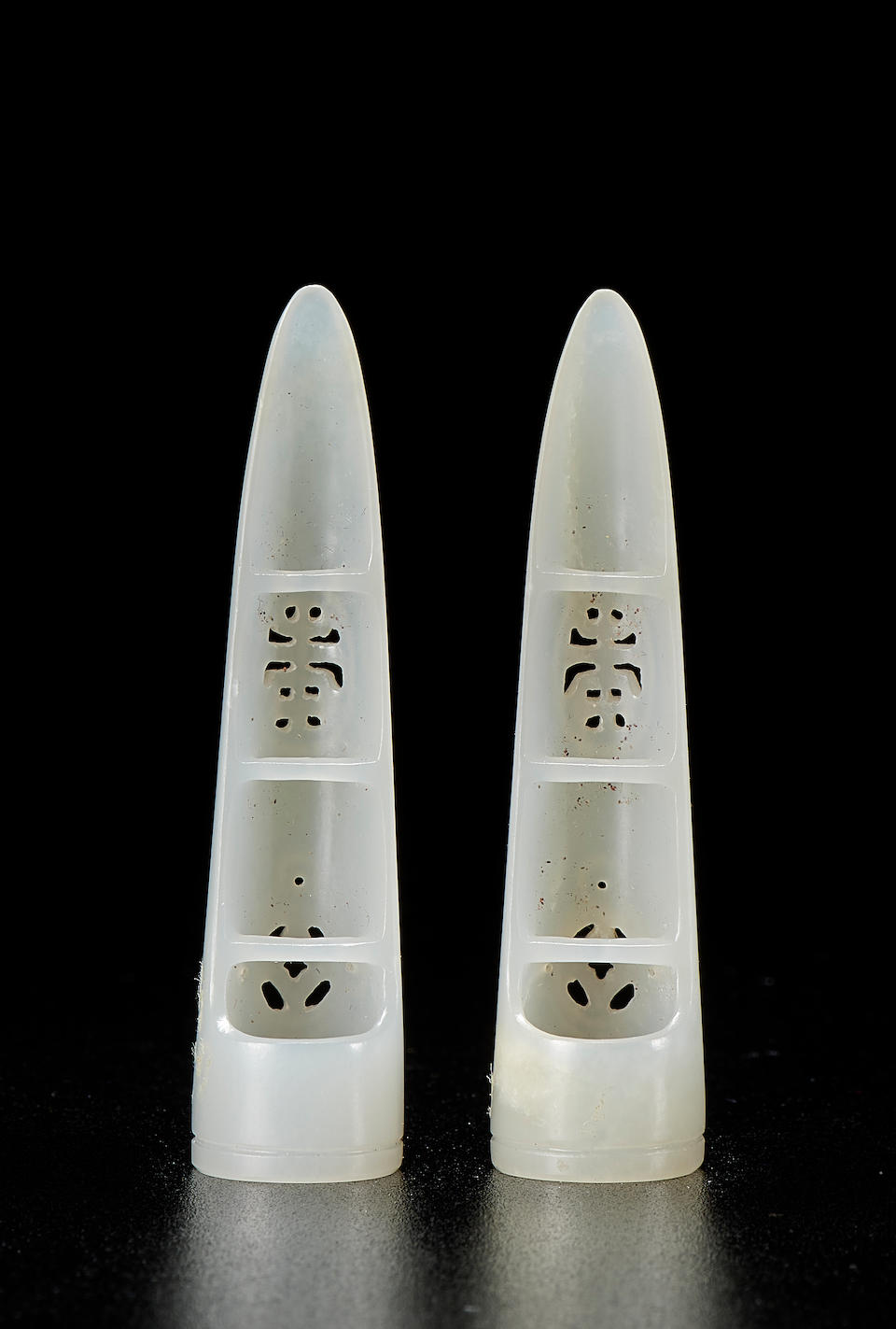 A PAIR OF WHITE JADE NAIL GUARDS 18th century (2)
