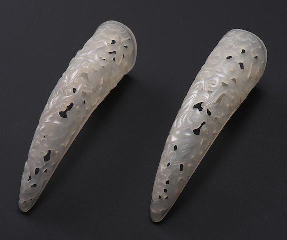 TWO PALE GREEN JADE RETICULATED NAIL GUARDS 19th century (3)