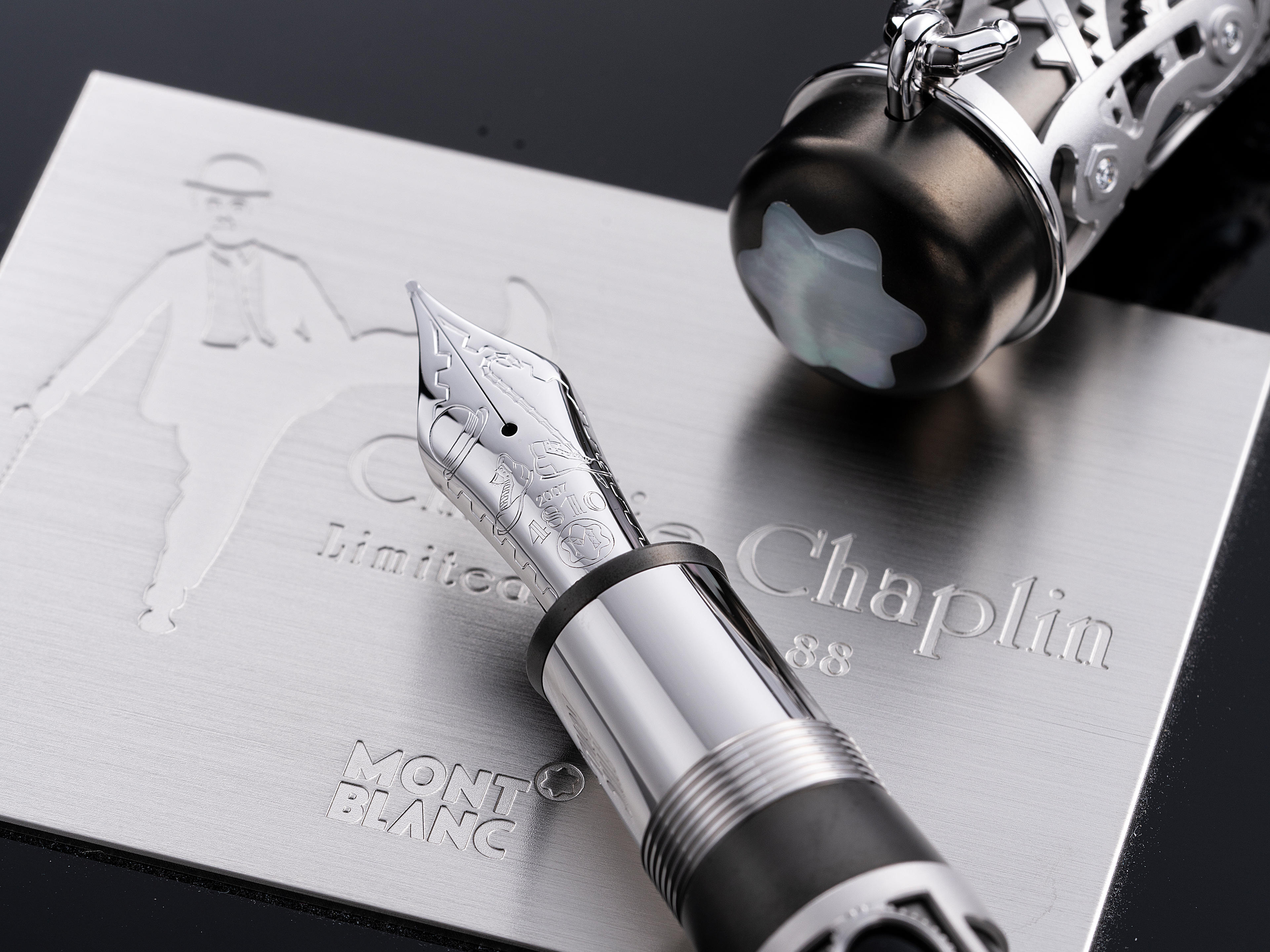 MONTBLANC | CHARLIE CHAPLIN, REF. 28717, AN EXTREMELY RARE, BRAND NEW ARTISAN LIMITED EDITION 18K WHITE GOLD, TITANIUM, DIAMOND AND BLACK LACQUER FOUNTAIN PEN