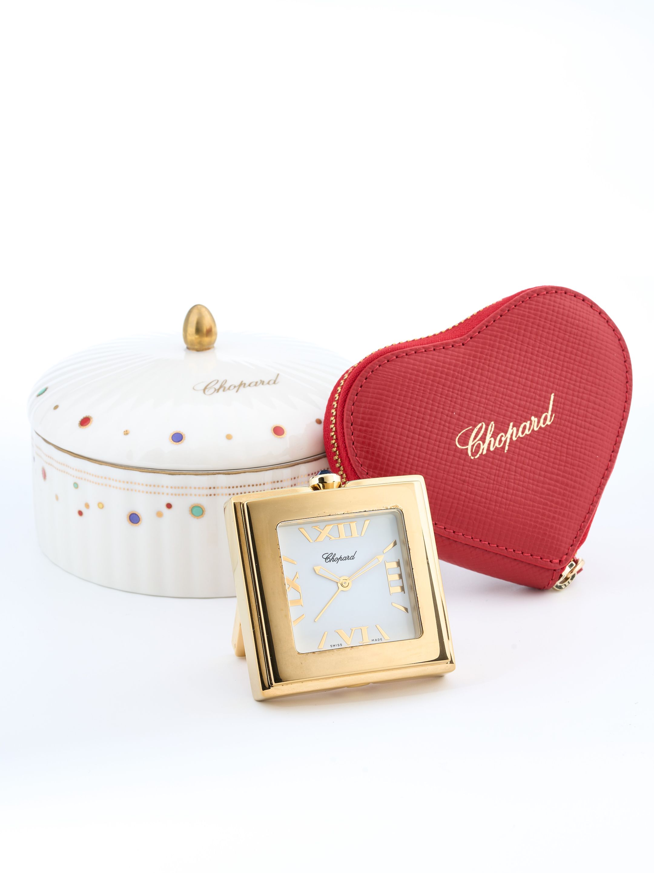 Bonhams : CHOPARD GROUP OF 3 AN ALARM TRAVEL CLOCK, A RARE PORCELAIN ...