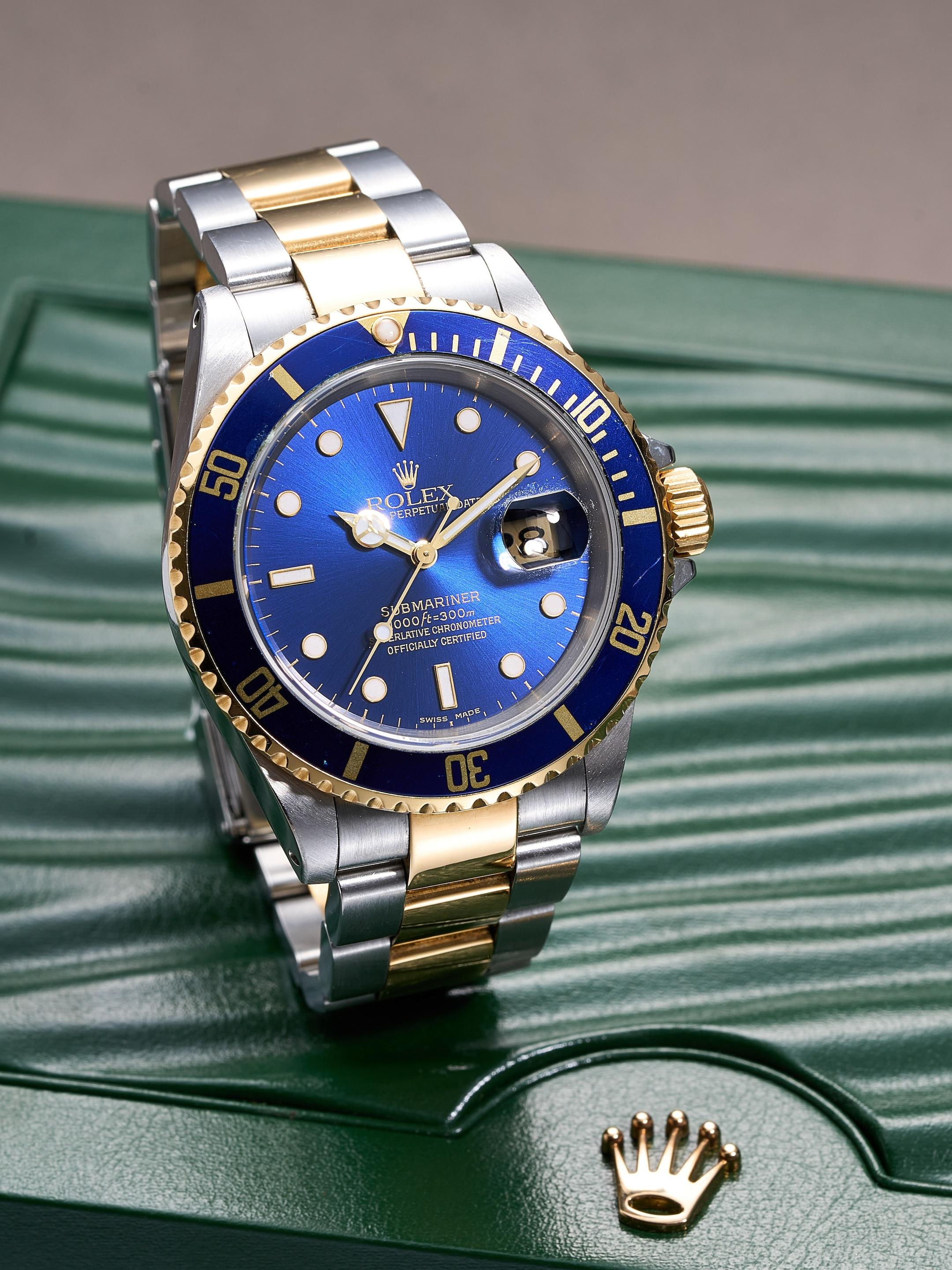 Bonhams ROLEX SUBMARINER, STAINLESS STEEL AND YELLOW GOLD BRACELET WATCH WITH DATE, 2000