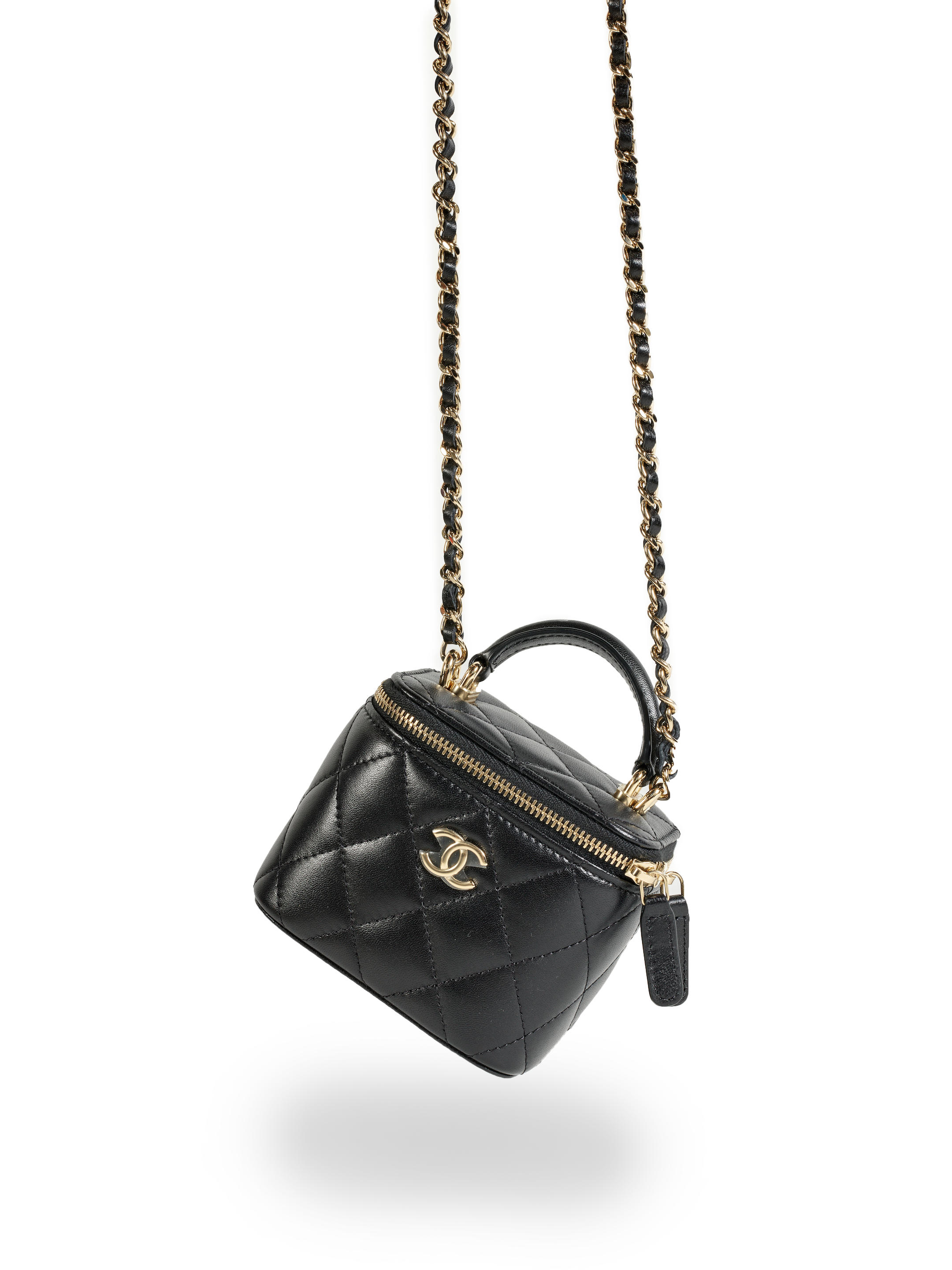 Bonhams : CHANEL BLACK LAMBSKIN SMALL VANITY CASE WITH TOP HANDLE GOLD  CHAIN (includes serial sticker, info booklet, authenticity card, original  dust bag and box)
