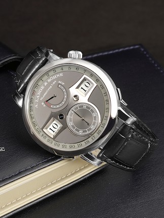 A. LANGE & SÖHNE  ZEITWERK DATE, REF.148.038, A NEW OLD STOCK WHITE GOLD WRISTWATCH WITH JUMPING HOUR, MINUTES, POWER RESERVE AND DATE, CIRCA 2021 image 1