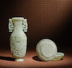 Thumbnail of A SMALL PALE GREEN JADE ARCHAISTIC VASE, A CIRCULAR PALE GREEN JADE ARCHAISTIC BOX AND COVER Qing Dynasty image 2