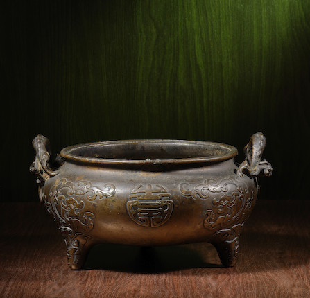 A BRONZE 'SHOU' TRIPOD INCENSE BURNER Xuande six-character mark, Ming/Qing Dynasty image 1
