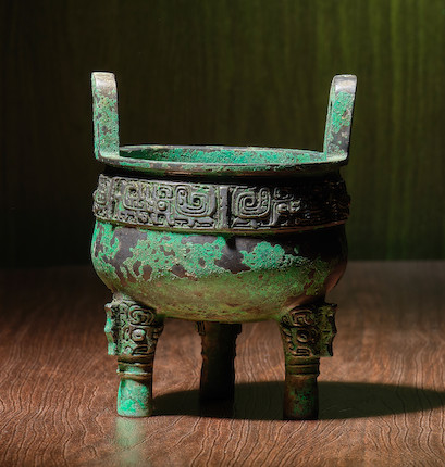 A RARE AND SMALL BRONZE 'TAOTIE' INCENSE BURNER, DING Song/Ming Dynasty image 1