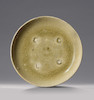 Thumbnail of A RARE AND SMALL GREEN-GLAZED 'FLORAL' DISH Southern Dynasties (2) image 1