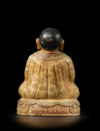 Bonhams A CARVED WHITE STONE PORTRAIT OF SONAM TSEMO TIBET, CIRCA