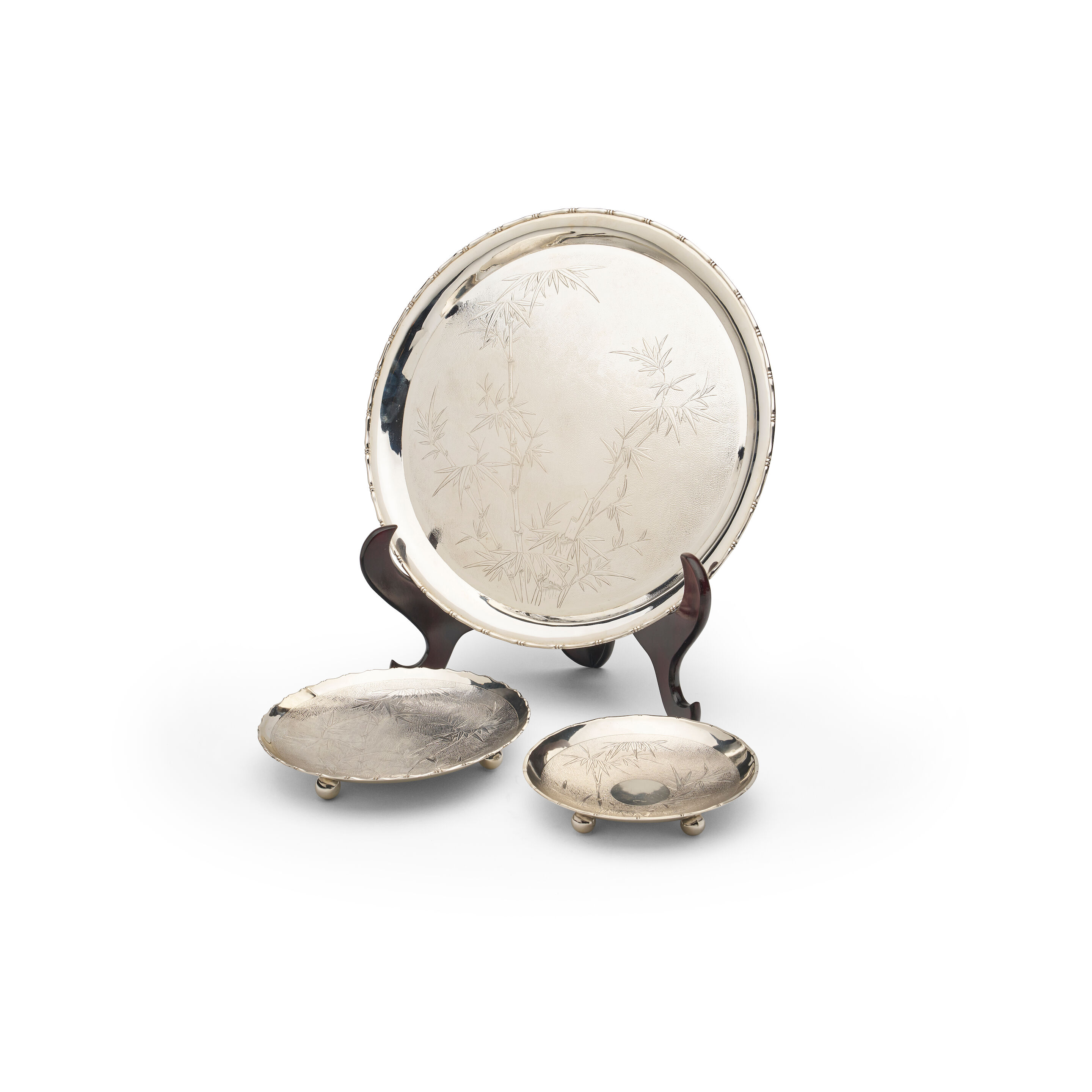 A Wai Kee Hong Kong sterling silver platter and two footed plates